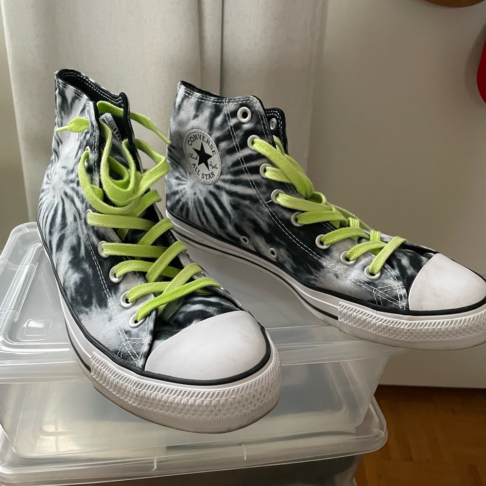 Tie dye effect Converse All Stars with neon green laces.